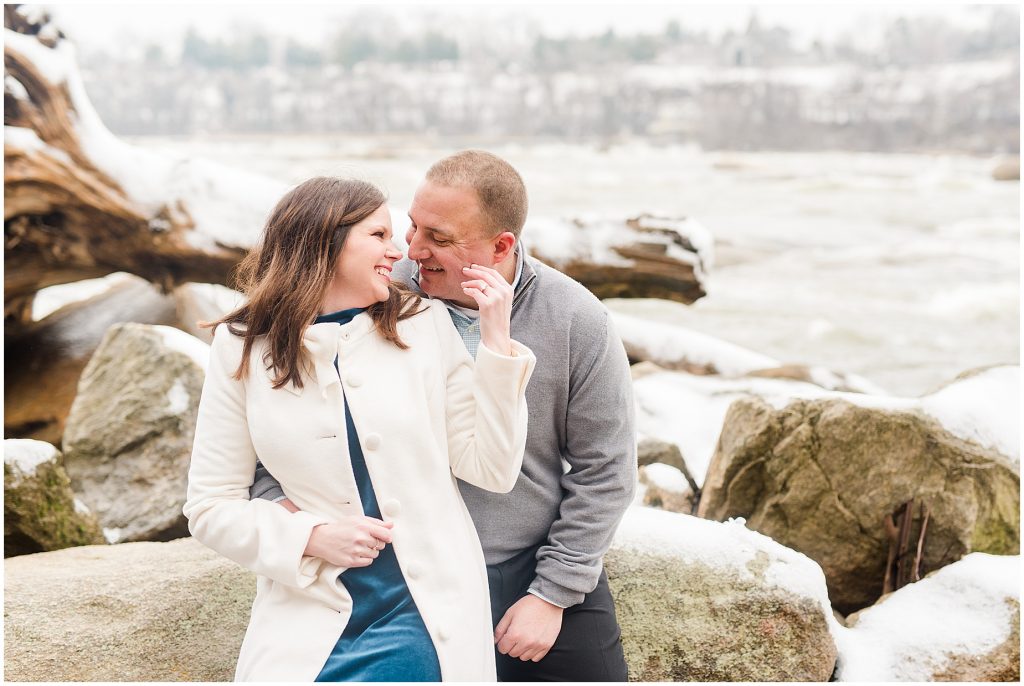 snowy riverfront engagement session on belle isle in downtown richmond