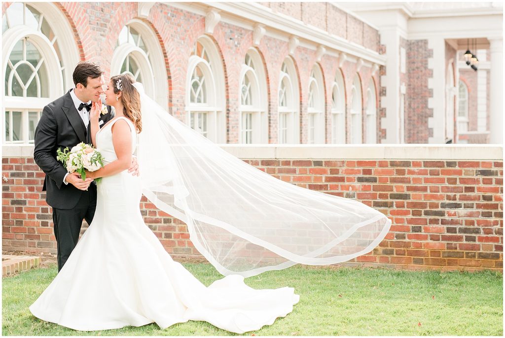 summer virginia beach wedding at the cavalier hotel bride and groom veil wedding day timeline